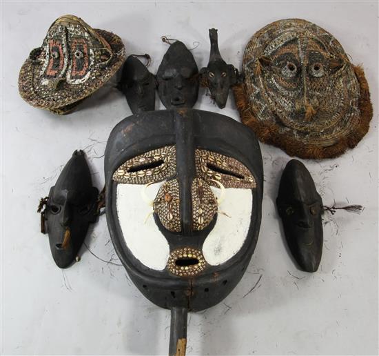 Sepik River large wooden mask, 5 small masks & 2 woven masks (8)